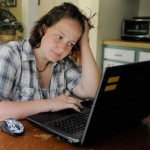 Cyberbullying Girl at laptop from cyber bullying article